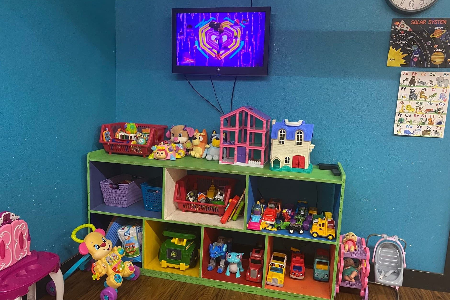 Toys and TV in the Kids Club room at Absolute Fitness