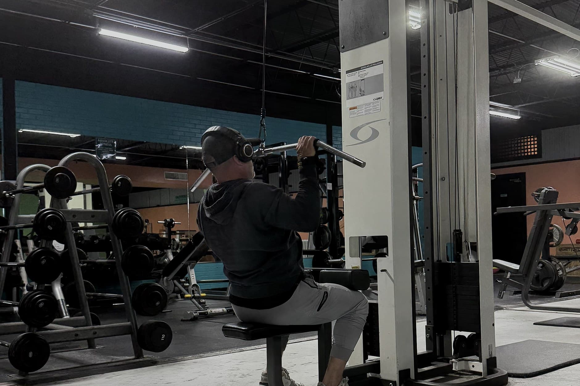 Member on the lat pulldown at Absolute Fitness